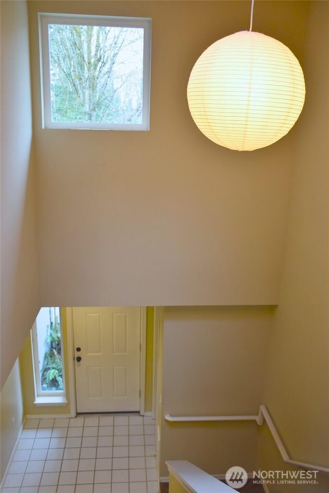 interior space with light tile patterned floors