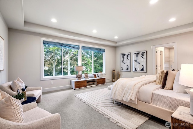 bedroom featuring carpet, ensuite bathroom, baseboards, and recessed lighting