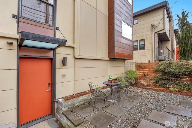 doorway to property with a patio area