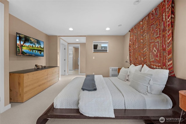 carpeted bedroom with recessed lighting