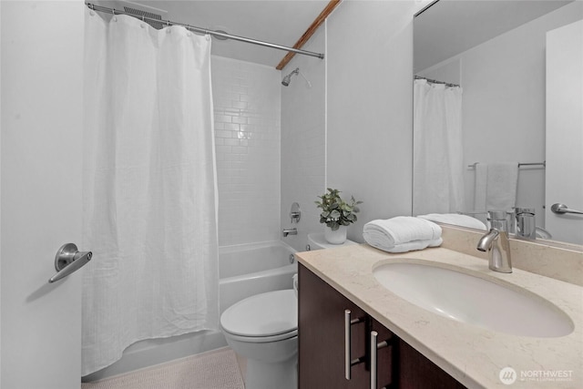 full bath featuring toilet, vanity, and shower / bath combination with curtain