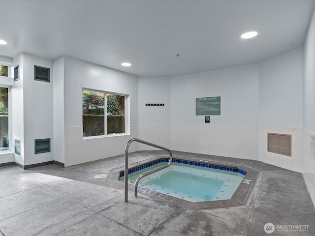 view of pool featuring an indoor in ground hot tub