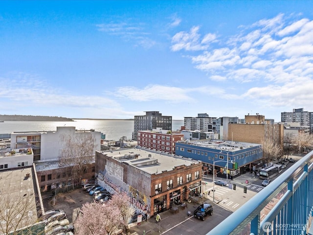 property's view of city featuring a water view