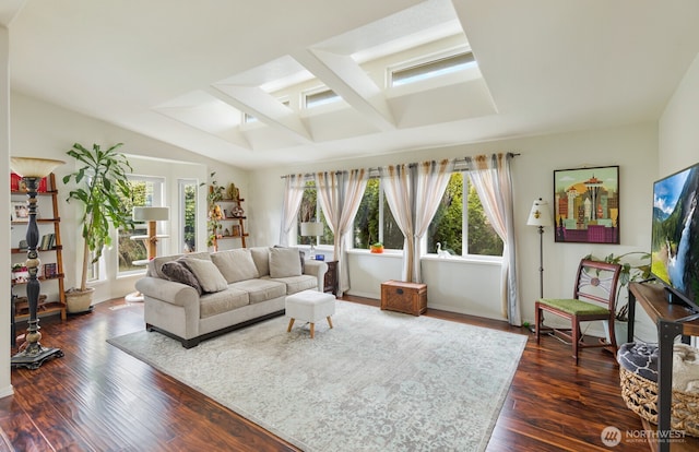 living room featuring dark wood finished floors and vaulted ceiling with skylight