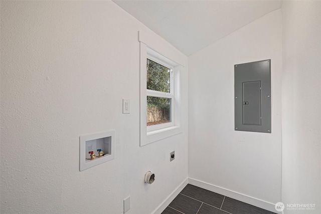 laundry area featuring hookup for a washing machine, laundry area, baseboards, electric panel, and electric dryer hookup