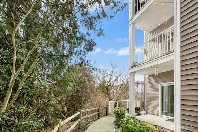 view of patio with a balcony