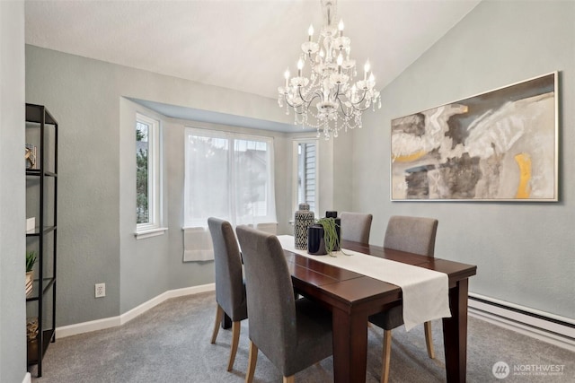 dining space featuring a baseboard heating unit, carpet, lofted ceiling, and baseboards