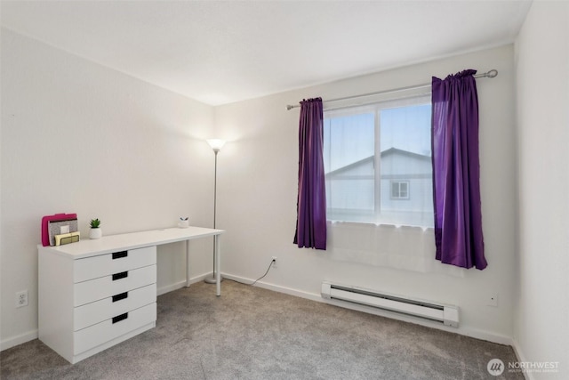 unfurnished office featuring a baseboard heating unit, light colored carpet, and baseboards