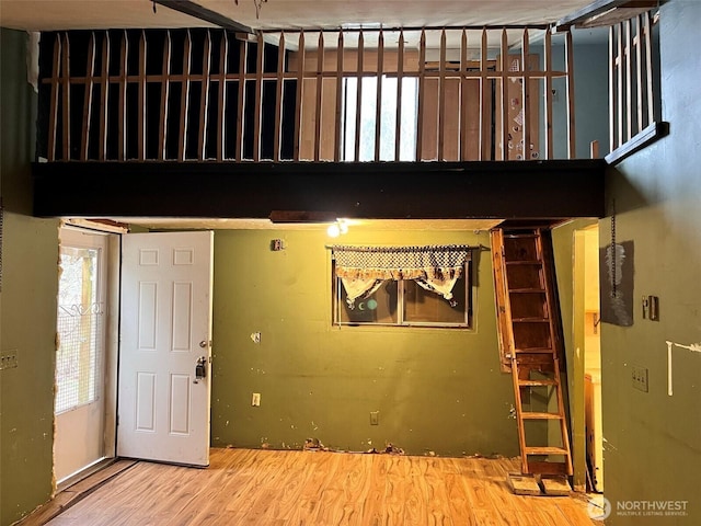 foyer featuring wood finished floors