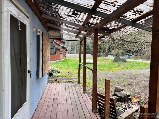 wooden deck with a yard