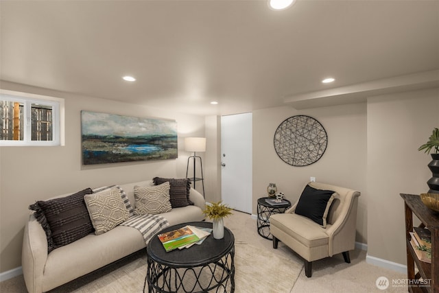 living area with recessed lighting, baseboards, and light carpet