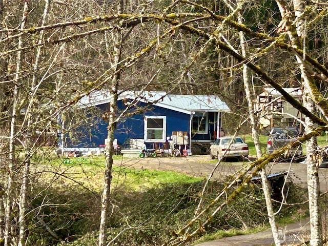 view of front of property with metal roof