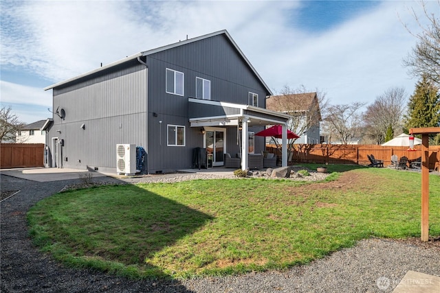 back of house with ac unit, a patio, a lawn, and fence