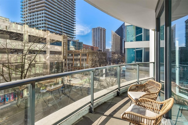 balcony featuring a city view