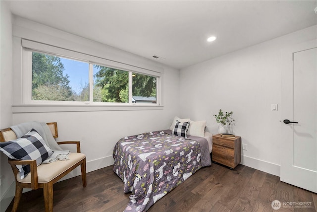 bedroom featuring recessed lighting, baseboards, and wood finished floors