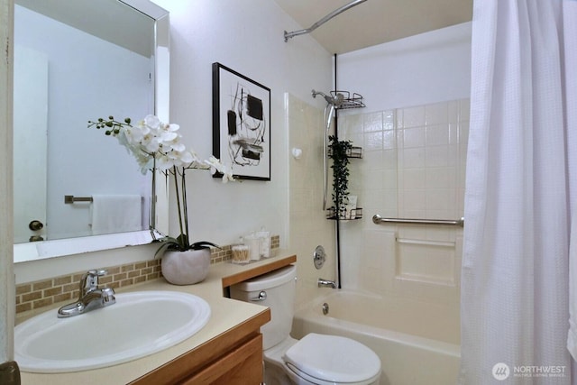 bathroom featuring tasteful backsplash, shower / tub combo with curtain, vanity, and toilet