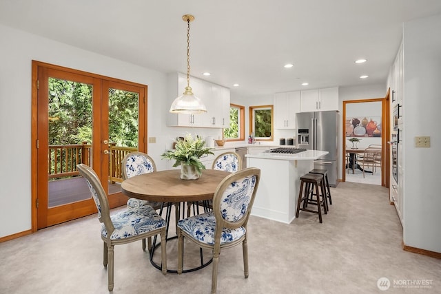 dining room with recessed lighting, baseboards, and french doors