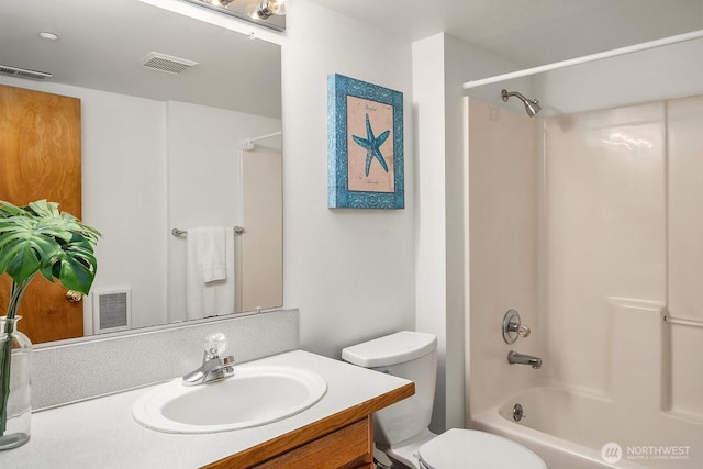 full bath with toilet, visible vents, and vanity