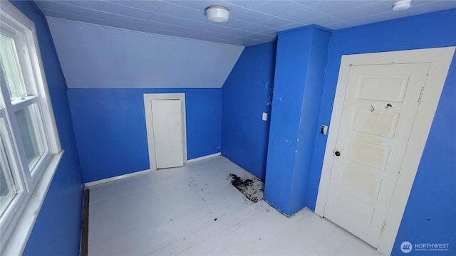 bonus room featuring lofted ceiling