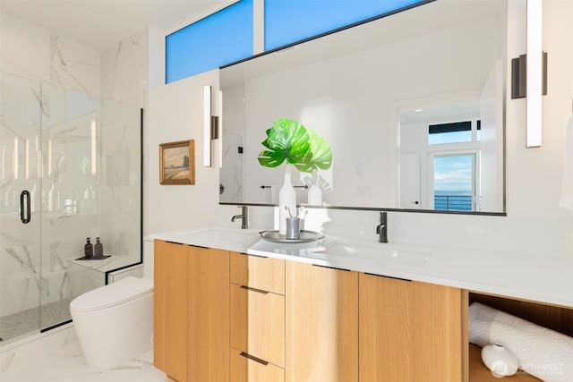 bathroom with a sink, a marble finish shower, toilet, and marble finish floor