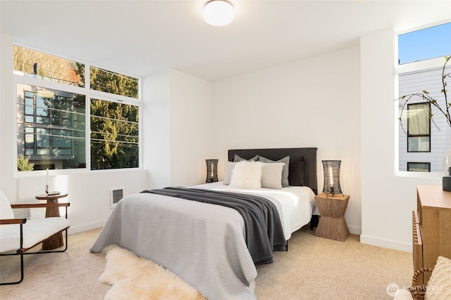 bedroom featuring visible vents, baseboards, and carpet floors