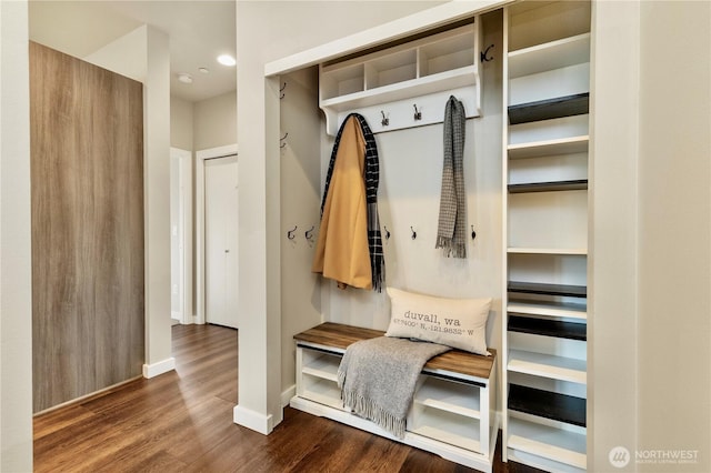 mudroom featuring baseboards, wood finished floors, and recessed lighting