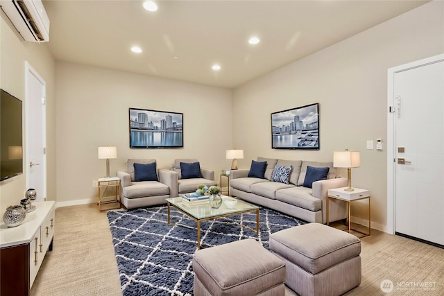 living area featuring recessed lighting, light colored carpet, baseboards, and a wall mounted AC