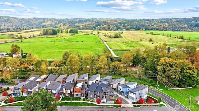 birds eye view of property featuring a residential view and a rural view