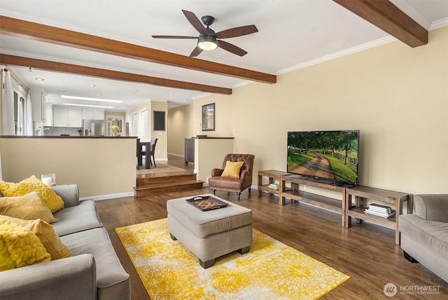 living area featuring recessed lighting, ornamental molding, a ceiling fan, wood finished floors, and beamed ceiling