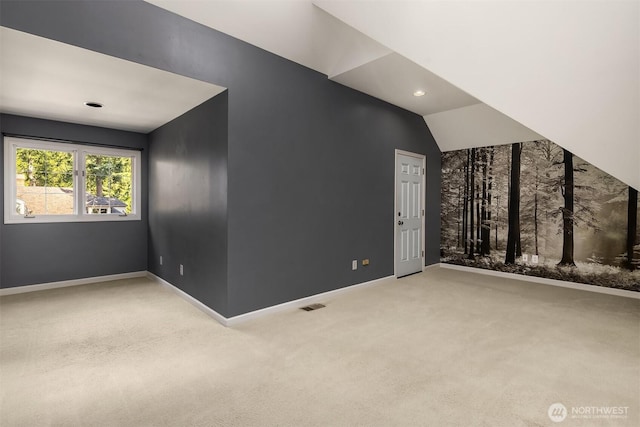 bonus room with lofted ceiling, recessed lighting, carpet floors, visible vents, and baseboards