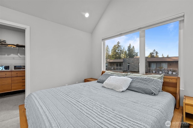 bedroom featuring recessed lighting and lofted ceiling