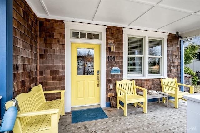 entrance to property with covered porch