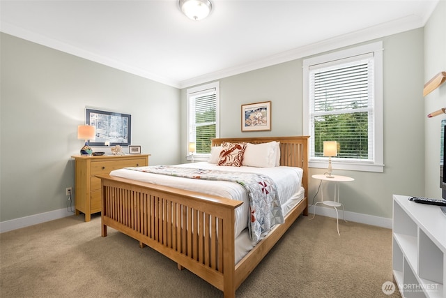 bedroom featuring baseboards, ornamental molding, and light colored carpet