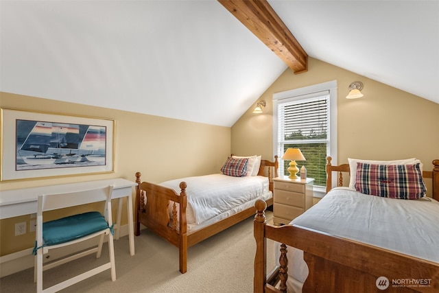 bedroom with lofted ceiling with beams and carpet flooring