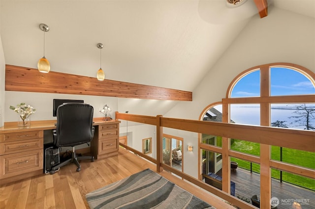 home office with high vaulted ceiling, beam ceiling, visible vents, and light wood finished floors