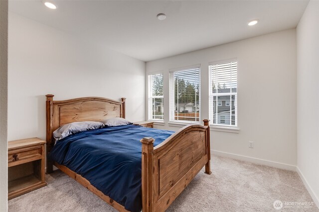 bedroom featuring carpet floors, recessed lighting, and baseboards