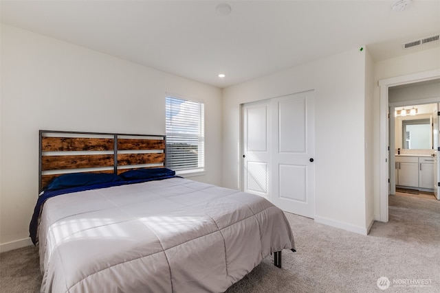 bedroom featuring baseboards, visible vents, and carpet flooring