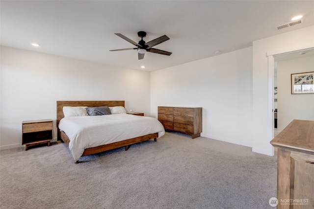 carpeted bedroom with baseboards, recessed lighting, visible vents, and a ceiling fan