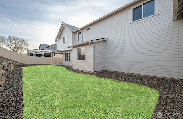 view of yard featuring fence