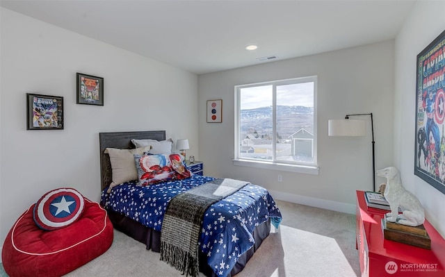 bedroom featuring carpet flooring, visible vents, and baseboards