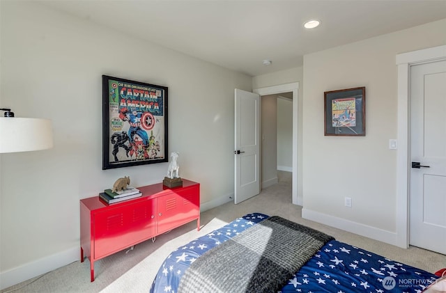 bedroom with recessed lighting, baseboards, and carpet floors