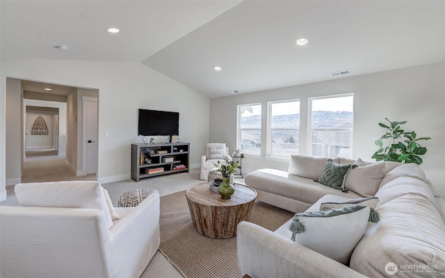 living area with visible vents, baseboards, light colored carpet, lofted ceiling, and recessed lighting