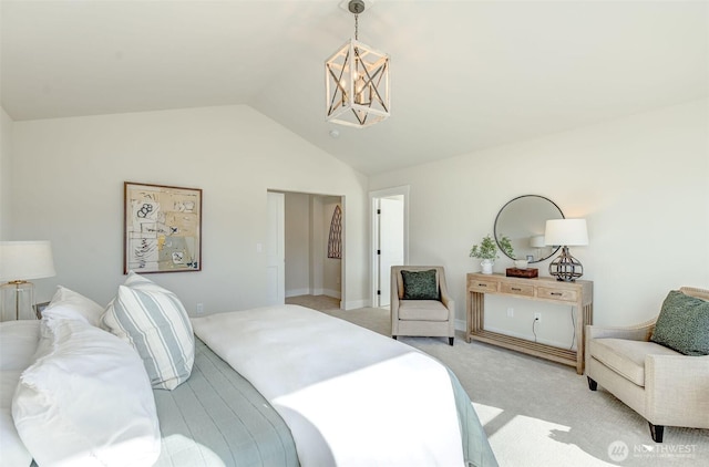 bedroom featuring a chandelier, light colored carpet, and lofted ceiling