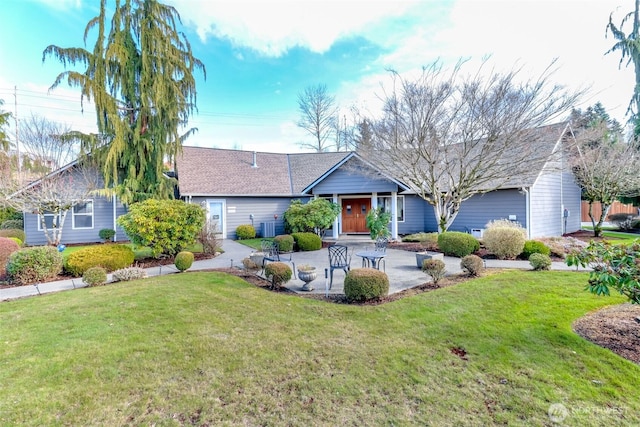 ranch-style house featuring a patio area and a front lawn