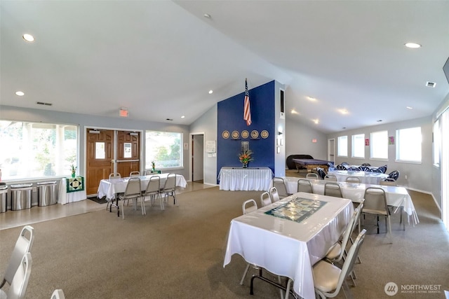 carpeted dining room featuring visible vents, vaulted ceiling, and recessed lighting