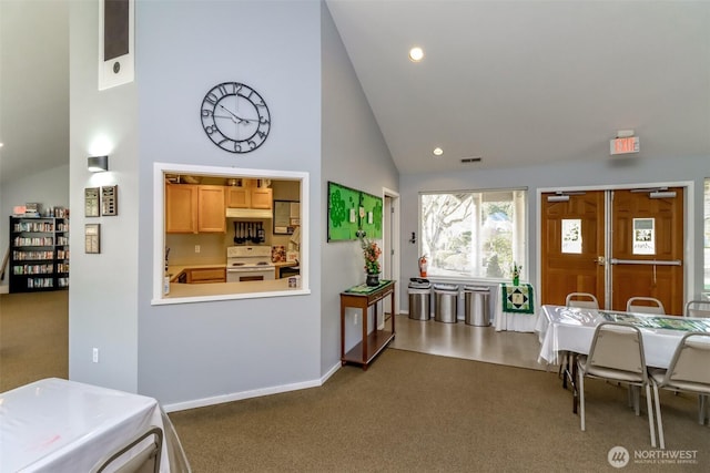 interior space featuring visible vents, carpet, high vaulted ceiling, white range with electric cooktop, and recessed lighting