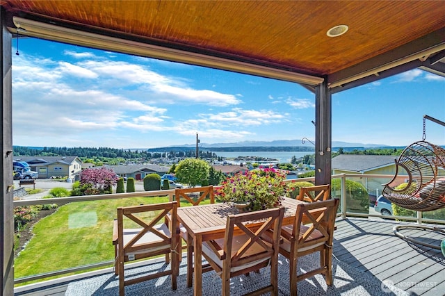 balcony featuring a water view