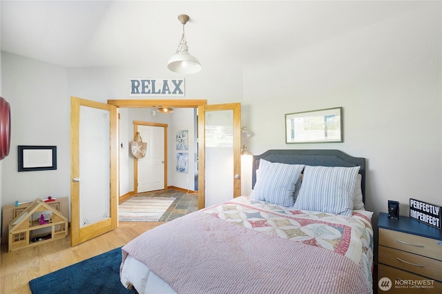 bedroom with wood finished floors