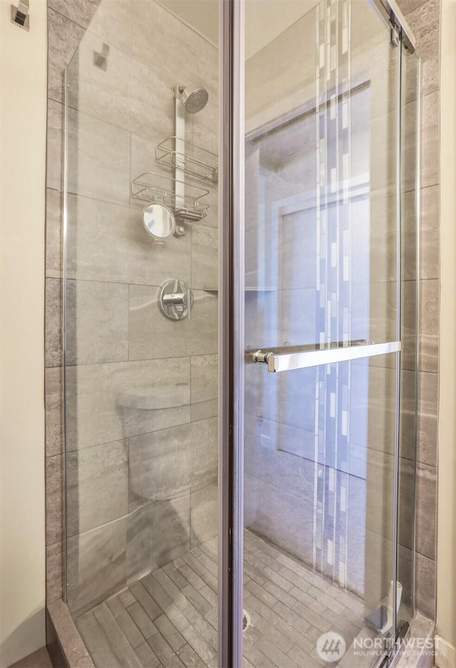 bathroom featuring a stall shower