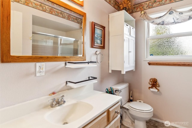 full bath featuring an enclosed shower, toilet, and vanity